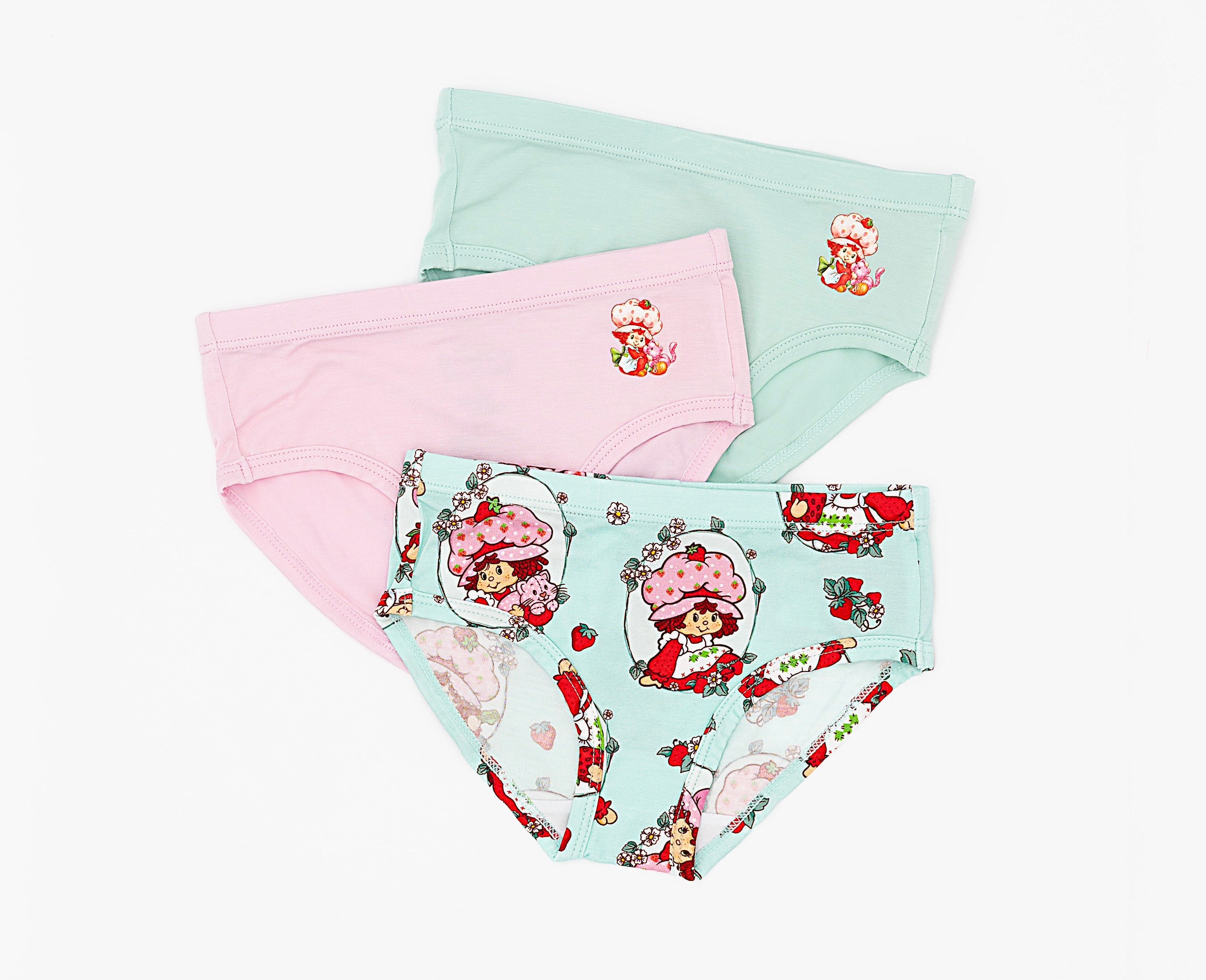 Three pairs of Strawberry Shortcake™ underwear on a white background